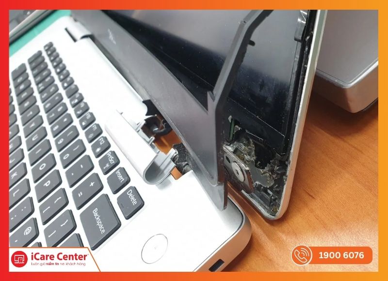 Laptop bị gãy bản lề gây hỏng màn hình và linh kiện